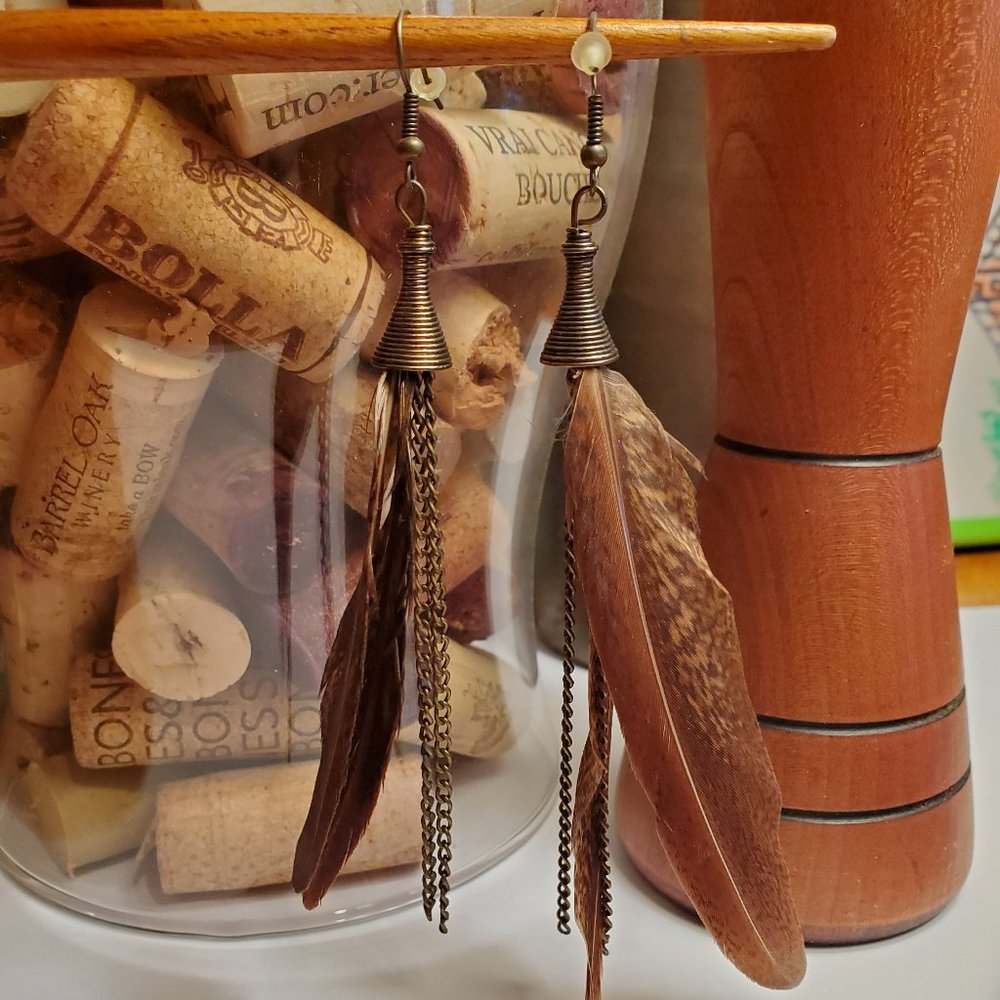Feather dangles with bronze chain and accents